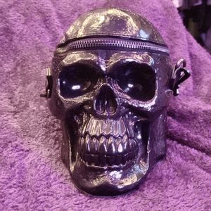Black vinyl Killstar skull handbag with shoulder strap.